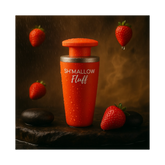 Sh'mallow Fluff perfume bottle with strawberries, showcasing its fruity and sweet fragrance appeal.